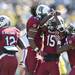 South Carolina cornerback Jimmy Legree celebrates an interception with teammates linebacker Shaq Wilson and cornerback Akeem Auguste in the first quarter of the Outback Bowl at Raymond James Stadium in Tampa, Fla. on Tuesday, Jan. 1. Melanie Maxwell I AnnArbor.com